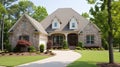 Victorian style brick family house exterior with roof tiles. Beautiful landscaped front yard with lawn and pruned shrubs. Created