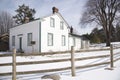 Victorian style house exterior with wooden  post and rail fence in winter Royalty Free Stock Photo