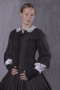Victorian woman in black bodice and skirt