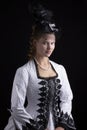 Victorian woman in black and white bustle dress and hat Royalty Free Stock Photo