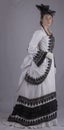 Victorian woman in black and white bustle dress Royalty Free Stock Photo