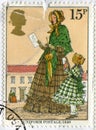 Victorian woman and child mailing letter