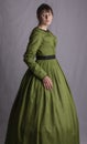Victorian woman in a green bodice and skirt Royalty Free Stock Photo