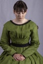 Victorian woman in a green bodice and skirt Royalty Free Stock Photo