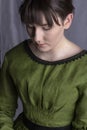 Victorian woman in a green bodice and skirt Royalty Free Stock Photo