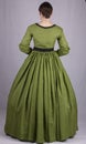 Victorian woman in a green bodice and skirt Royalty Free Stock Photo