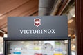 Victorinox brand logo and text sign store of knife manufacturer and watchmaker shop