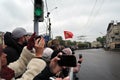 Victory Day celebration in Moscow. People take photos of machines
