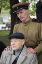 Victory Day celebration in Moscow. Senior man and young man