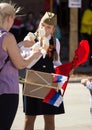 Victory Day in Moscow. Beautiful girl in military uniform with an ice cream on Victory Day. Royalty Free Stock Photo