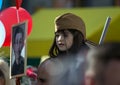 Victory Day in Moscow. Beautiful girl in military uniform with red balls on Victory Day. Royalty Free Stock Photo