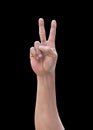 Victory hand of man with V shape sign two fingers gesture raised up isolated on black background with clipping path for vote, win Royalty Free Stock Photo