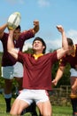 Victory is mine. a young rugby team celebrating a victory.