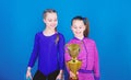 Victory of teen girls. Acrobatics and gymnastics. Little girls hold jump rope. Winner in competition. Sport success
