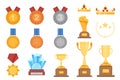 Victory trophies set in cartoon design. Bundle of golden, silver and bronze medals, win crowns, different gold cups, star emblems