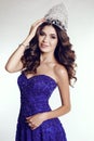 Victress of beauty contest wearing luxurious sequin dress and precious crown Royalty Free Stock Photo