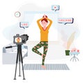 Video Blogger practice yoga. Streaming home workout. Vlogger have live sport activity in room. Woman records physical