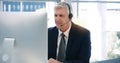 Video call, computer and a mature business man using a headset in the office during an online meeting. Desktop, smile