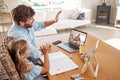 Video call, education and learning with a girl, father and teacher in a remote meeting on a laptop from home to attend a