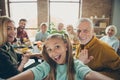 Video call from happy big family celebrate thanksgiving day october autumn event party small little girl kid make selfie Royalty Free Stock Photo