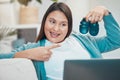 Video call, laptop and baby shoes with a mother making an online announcement about pregnancy. Pregnant, footwear and