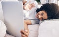 Video call, laptop and woman wave in bed in bedroom for online chat in the morning. Technology, communication and black Royalty Free Stock Photo