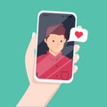 Video call with loved one. Female hand holding smartphone with b Royalty Free Stock Photo