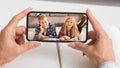 Video call or photo of children on modern smartphone, online lesson Royalty Free Stock Photo