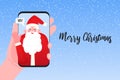 Video call to Santa Claus. Merry Christmas and Happy New Year greetings through incoming call and online video chat