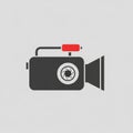Video camera icon. The camera is depicted in black with a red Royalty Free Stock Photo