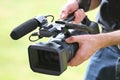 Video camera man with camera Royalty Free Stock Photo