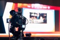 Video camera man recording live show digital broadcast of industry seminar event, professional production videographer Royalty Free Stock Photo