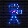 Video camera neon sign. Luminous signboard with retro film production equipment. Vector illustration Royalty Free Stock Photo