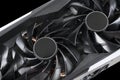 Video card with fan. Gaming graphics card for video games and cryptocurrency mining. Game video card isolated on black background Royalty Free Stock Photo