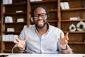 Video chat with an African-American guy wearing headset Royalty Free Stock Photo