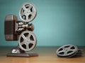 Video, cinema concept. Vintage film movie projector and reels on Royalty Free Stock Photo