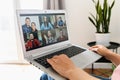 A young woman using laptop for video call, zoom