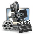 Video concept. Camera on laptop, still reels and clapboard. Royalty Free Stock Photo