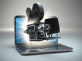 Video concept. Retro camera and laptop. Royalty Free Stock Photo