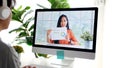 Video conference, Work from home, Asian woman holding business chart while making video call to business team with virtual web, Royalty Free Stock Photo