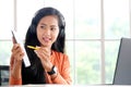 Video conference, Work from home, Asian woman making video call to business team with virtual web, Contacting colleague by Royalty Free Stock Photo