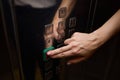 A video displaying a closeup view of someone pushing elevator buttons in an office building Royalty Free Stock Photo