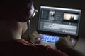 Video editing with laptop. Professional editor. Royalty Free Stock Photo