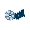 Video film reel with tape for record of entertainment cinema movie. Royalty Free Stock Photo