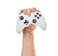 Video game console controller in gamer hands isolated on white background Royalty Free Stock Photo