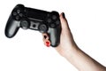 Video game console controller in gamer hands. Royalty Free Stock Photo