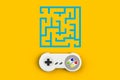 Video Game Console GamePad. Gaming Concept. Top View Retro Joystick With Maze Isolated On Yellow Background
