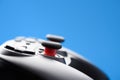 Video game controller. Game pad closeup on blue background Royalty Free Stock Photo