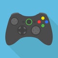 Video game controller icon, wireless grey gamepad. vector illustration in flat design with long shadow on blue background Royalty Free Stock Photo