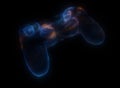 Video game controllers made of multicolored particles on black background